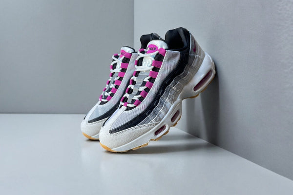 Nike SB Air Max 95 Cactus Flower skateboard shoe with Summit White layers, purple accents, and gum sole