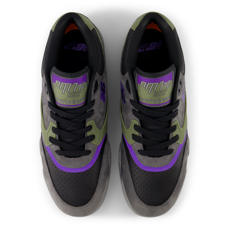 Pair of black and gray sneakers with purple accents on a white background